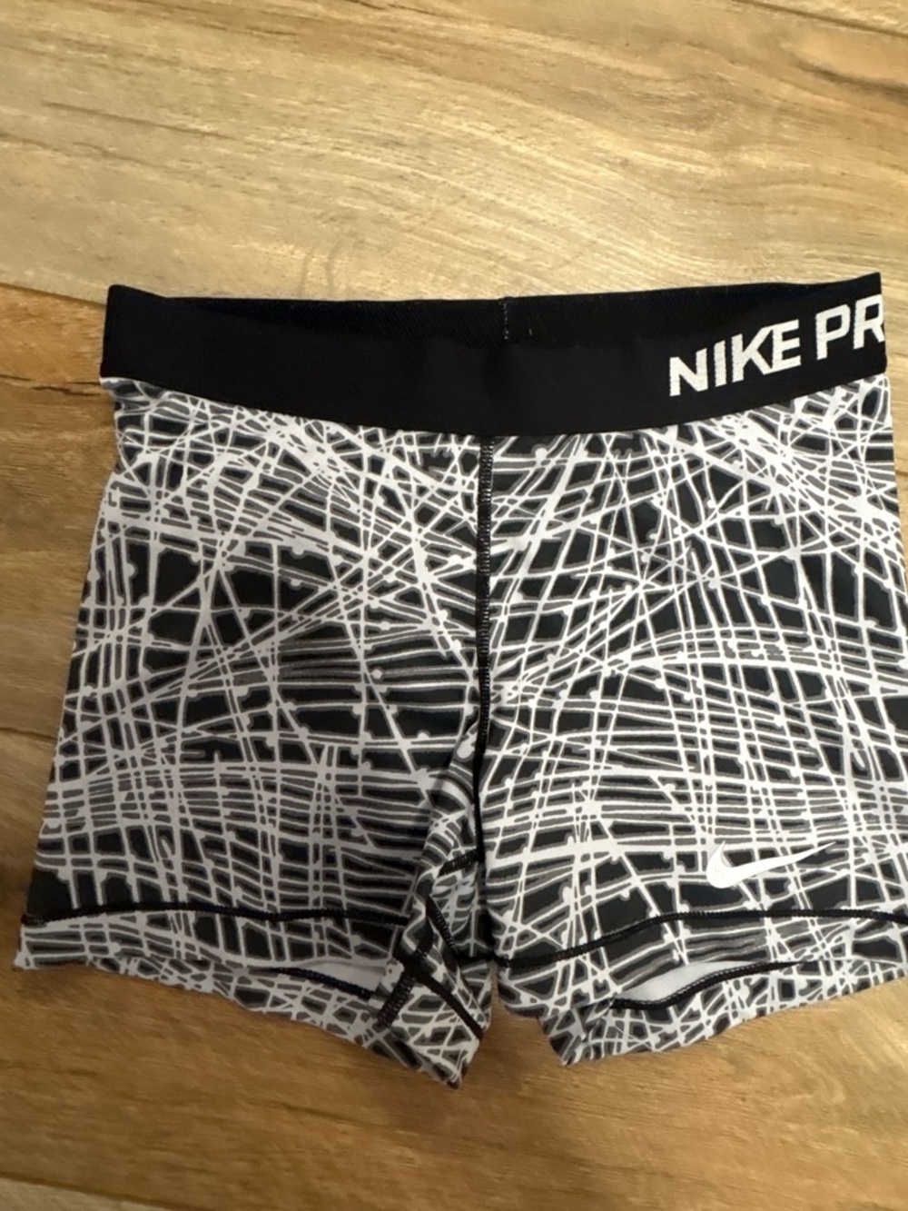 Women’s black and white Nike Pros